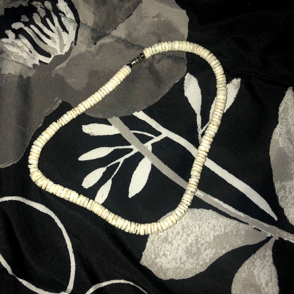 PUKA SHELL NECKLACE.